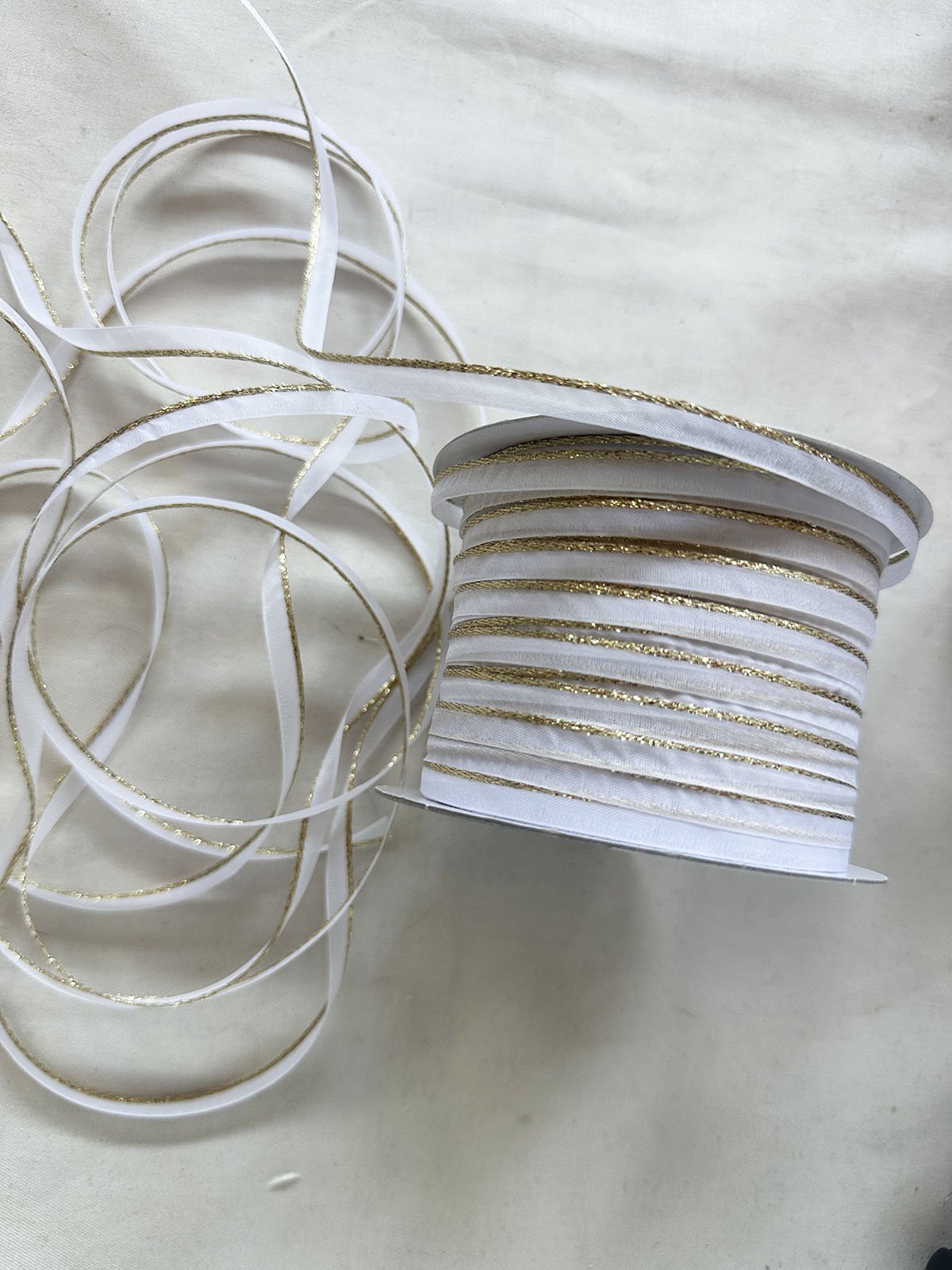Gold Sparkle White Organdy Piping - L'Etoffe Fabrics LLC