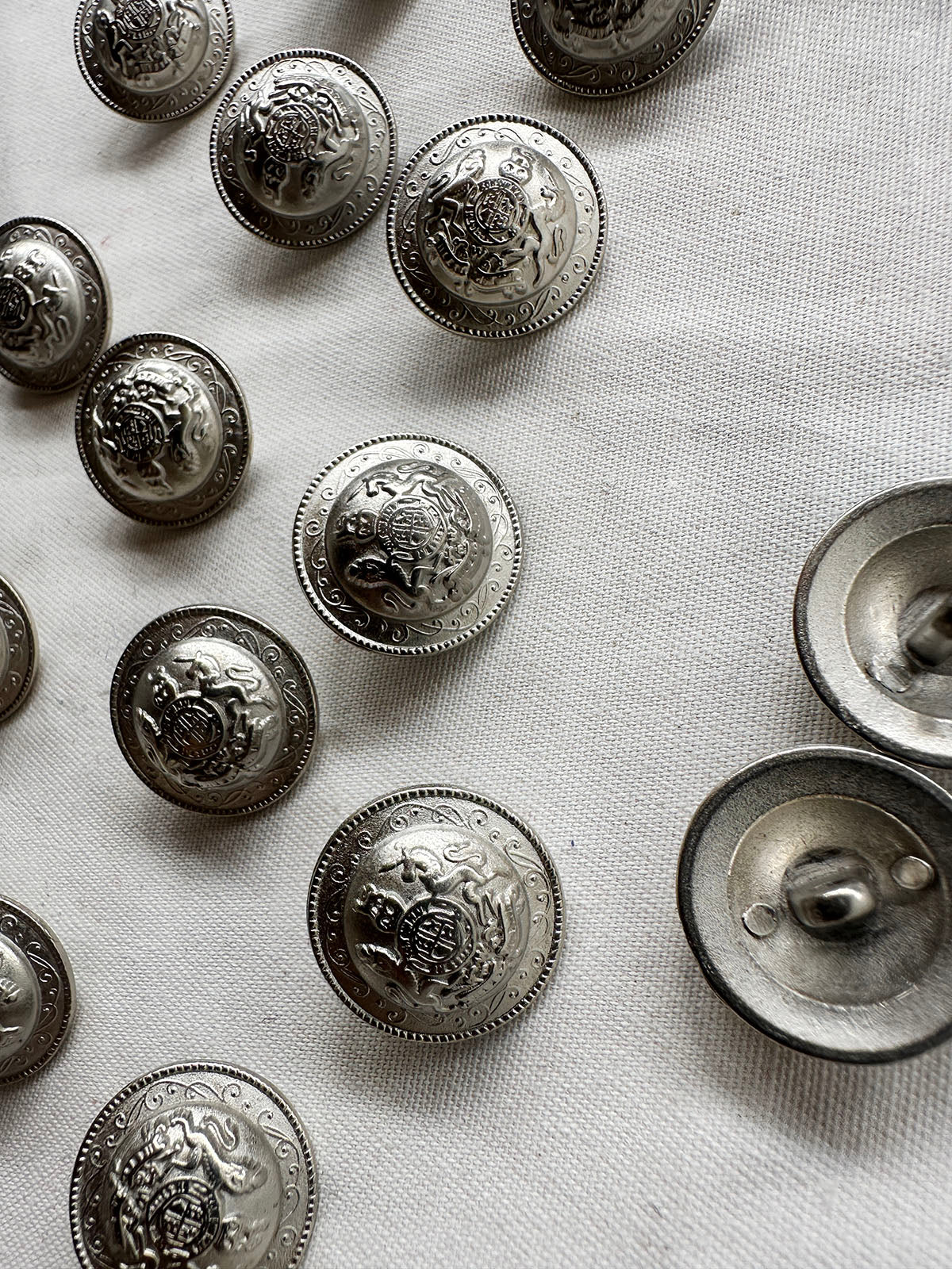 Matte Steel Coat Of Arms Dome Buttons - L'Etoffe Fabrics LLC