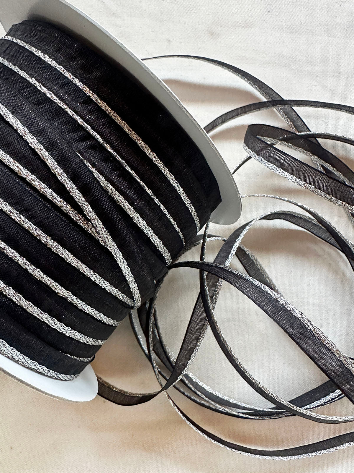 Silver Sparkle Black Organdy Piping - L'Etoffe Fabrics LLC
