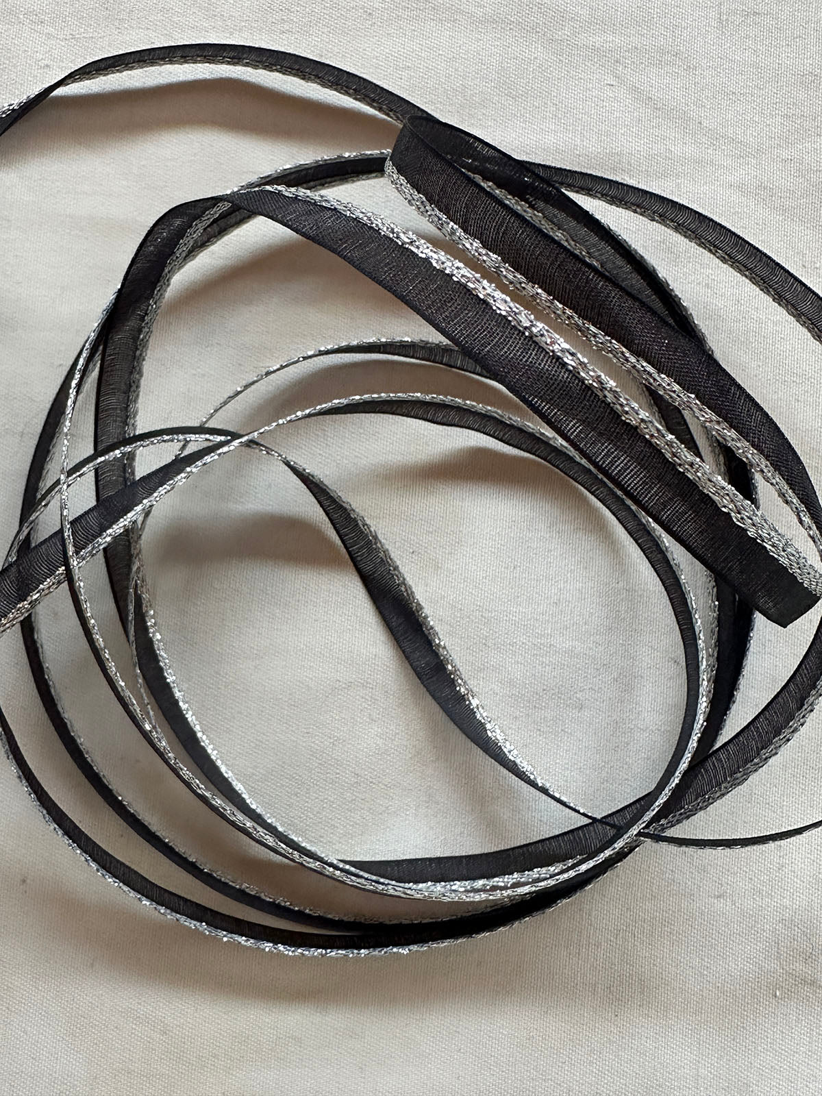Silver Sparkle Black Organdy Piping - L'Etoffe Fabrics LLC