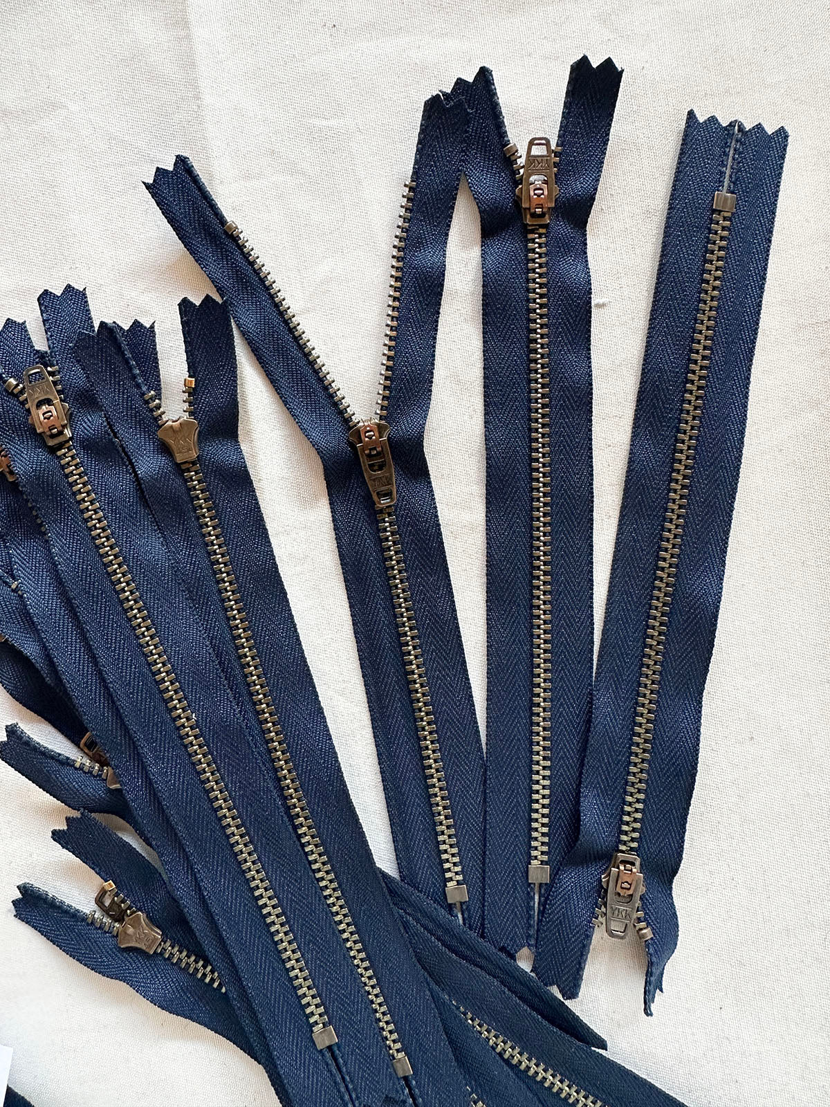 Deadstock YKK 4.5 Navy Jean Zipper Antique Brass Teeth - L'Etoffe Fabrics LLC
