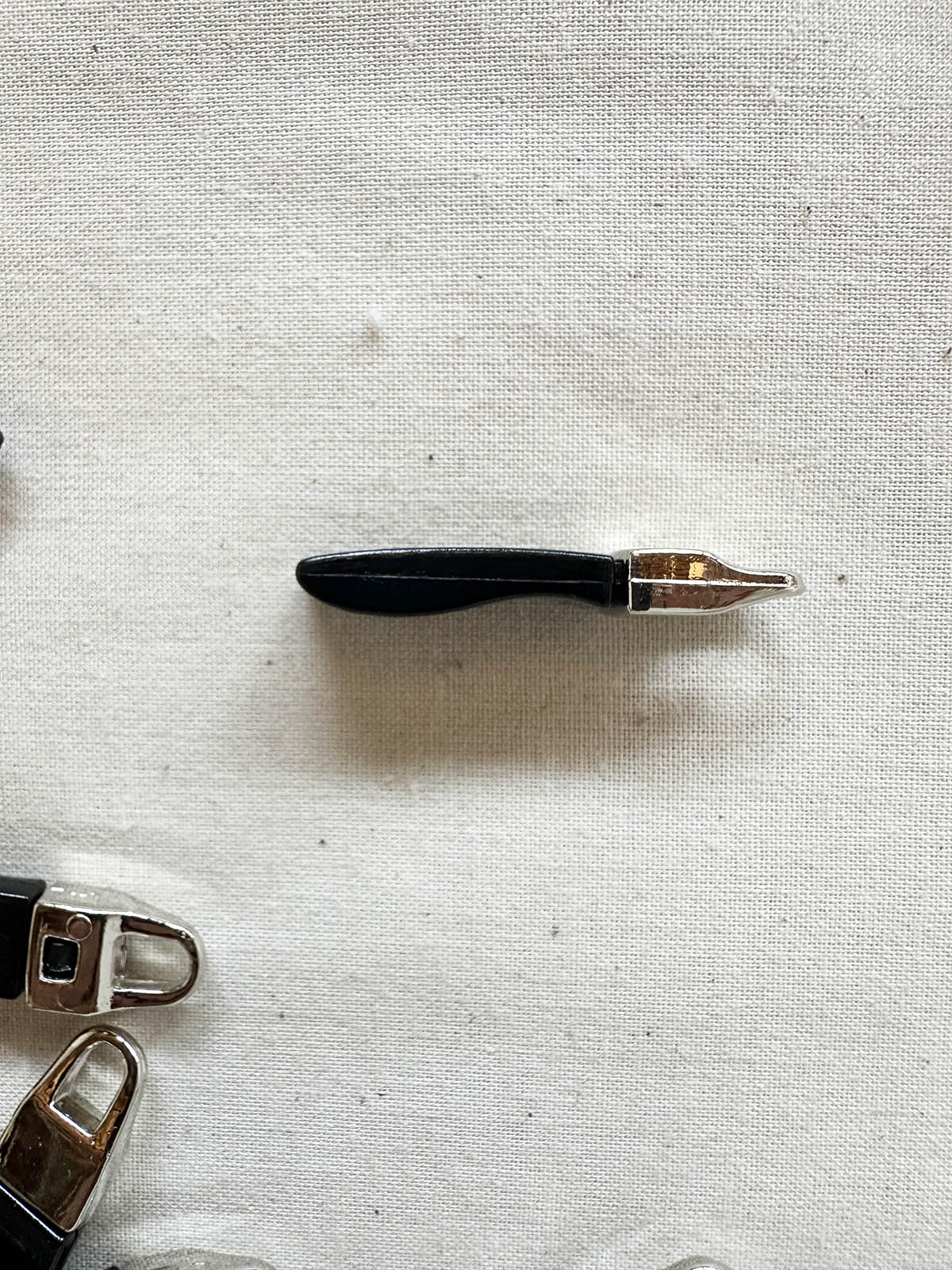 Designer Deadstock Zipper Pulls - Black - L'Etoffe Fabrics LLC