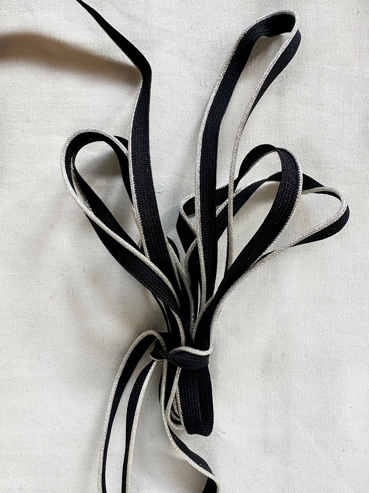 Silver Metallic with Black Piping - L'Etoffe Fabrics LLC